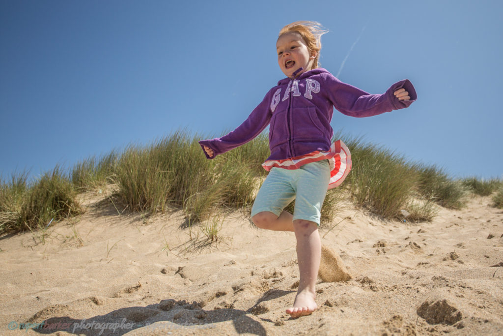 holywell sand dunes jumping girl daughter