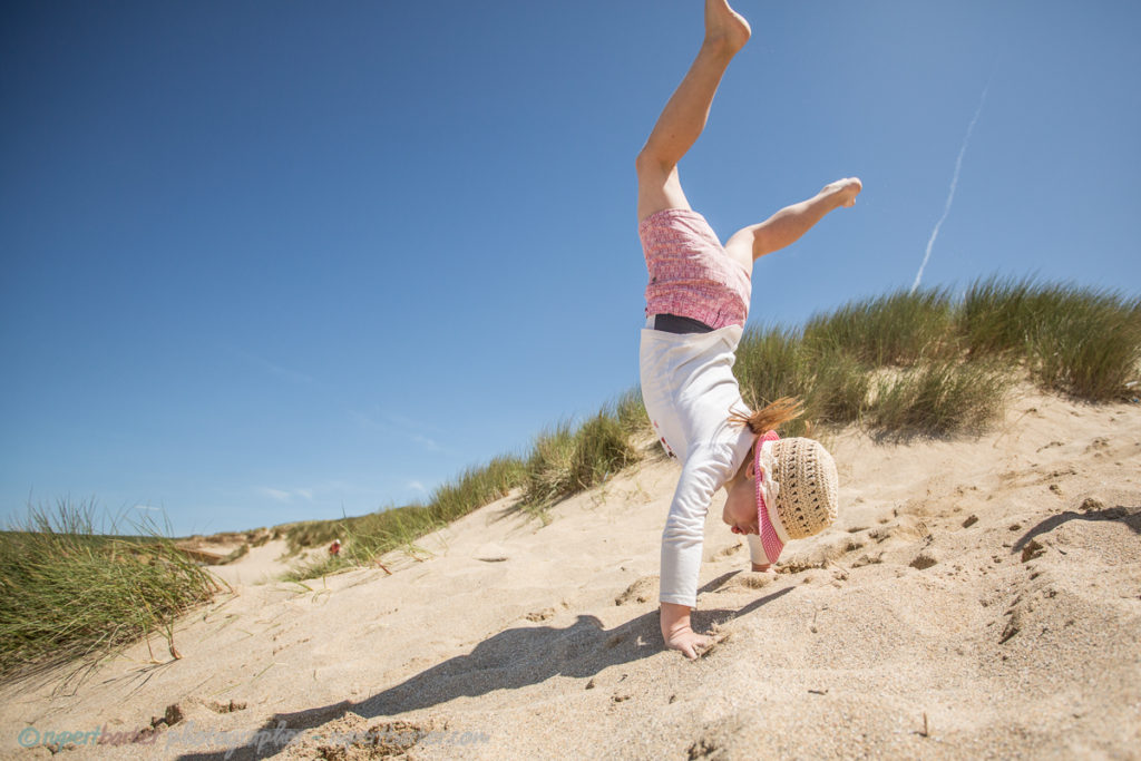 holywell sand dunes jumping girl daughter cartwheel