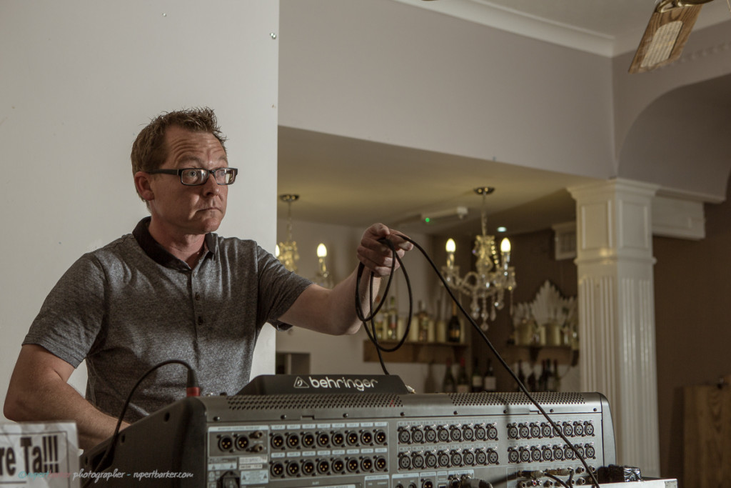 Neil Muttock Malmesbury Acoustic Sessions Portrait sound engineer mixing desk