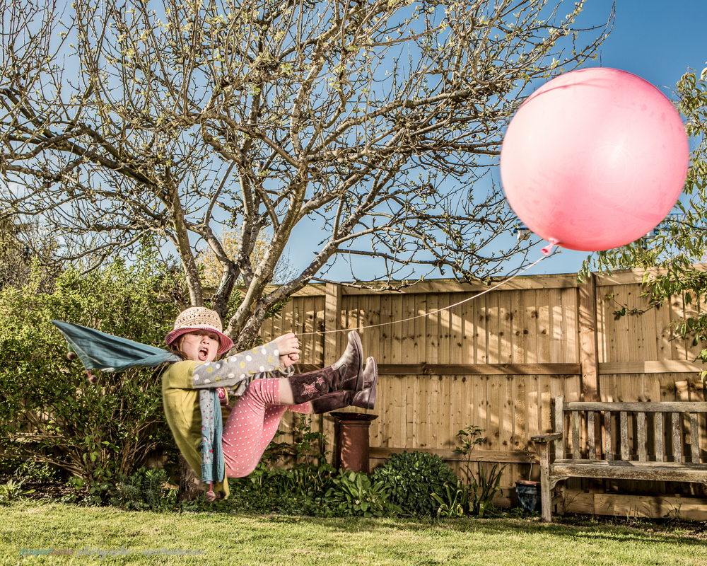 Flying balloon girl pink levitation
