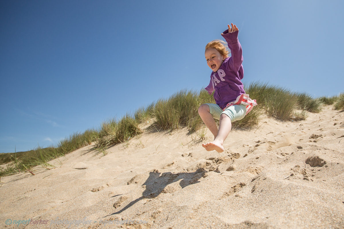 holywell sand dunes jumping girl daughter